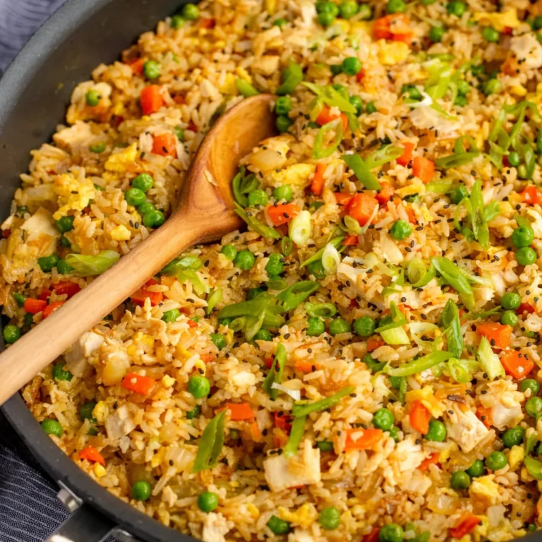 Delicious rotisserie chicken fried rice ready in 30 minutes with fresh vegetables.